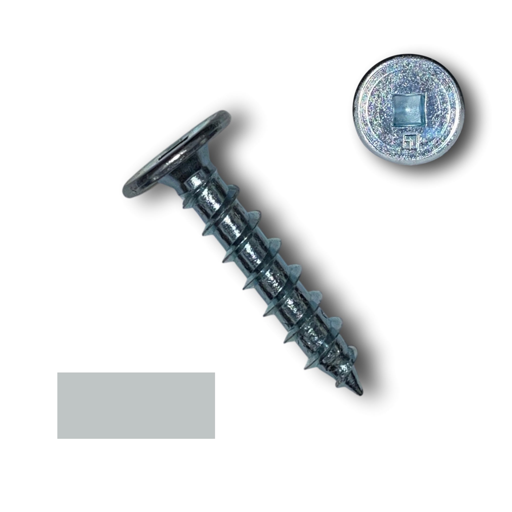 A zinc plated screw with a flat head used for standing seam metal roofing clips. This screw is 1 inch long and has a sharp tip to be used in wood decking. There is a color swatch in the bottom left corner and a close-up of the screw head in the top right corner. The screw is unpainted/silver in color.