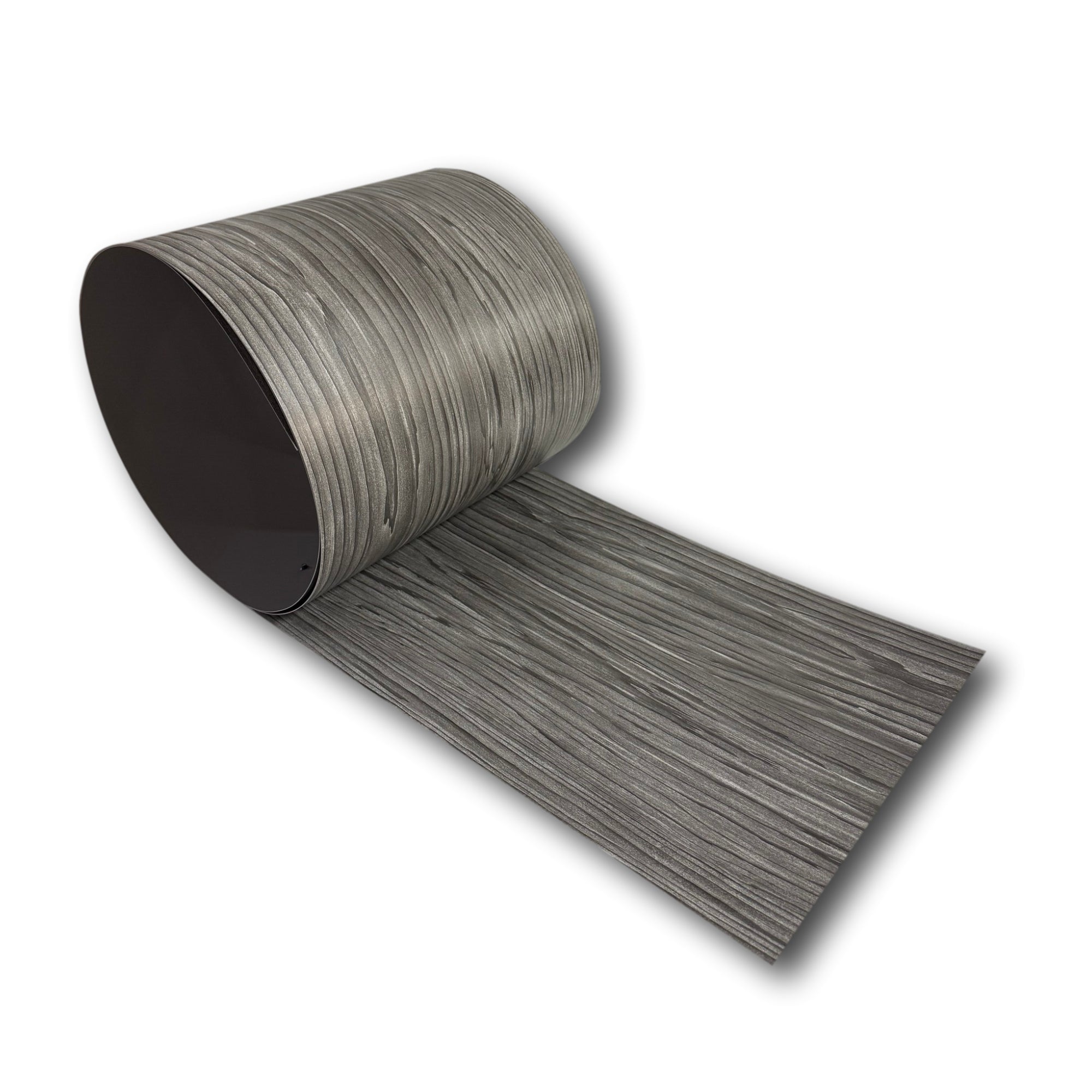 A roll of painted 24 Gauge Galvanized Steel with a Driftwood Gray Pattern throughout the material, only painted on one side. This material is used for wall flashings, roof flashings, siding, and accents.