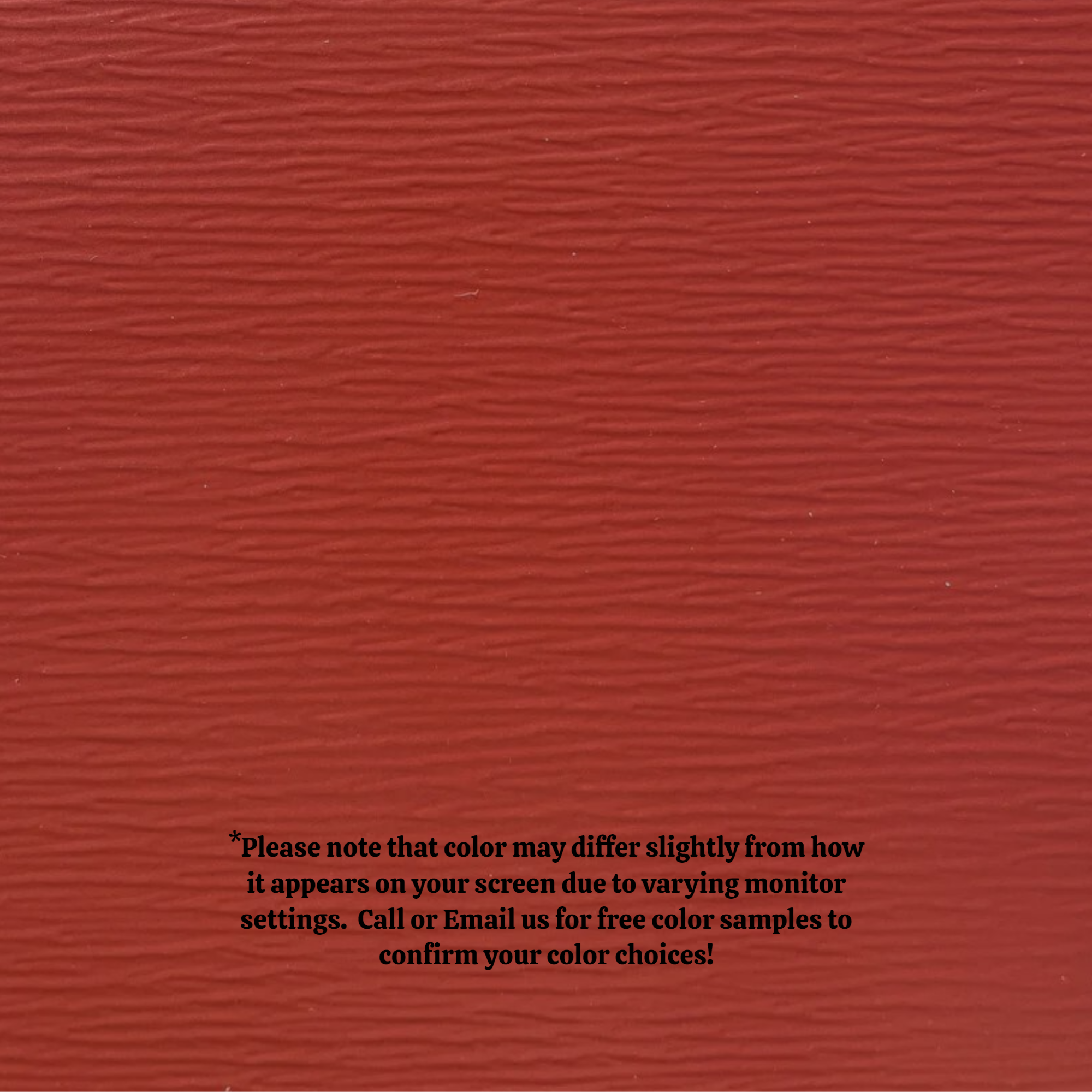 A close up of the texture of the Woodgrain Finish Aluminum Trim Coil that is Lighthouse Red in color.