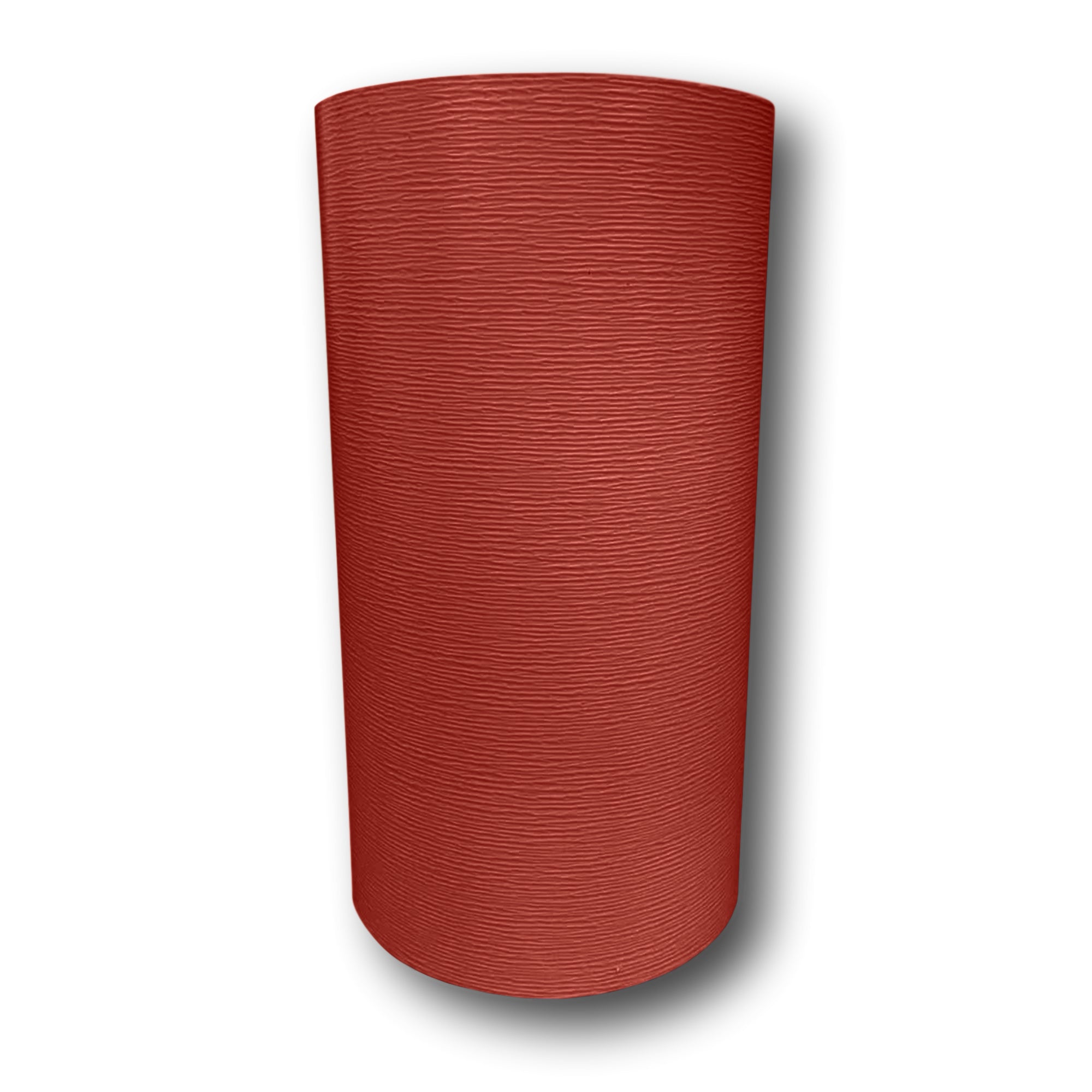 A roll of Woodgrain Finish Aluminum Trim Coil that is most commonly used for wrapping fascia, and door and window trim. The color is Lighthouse Red.