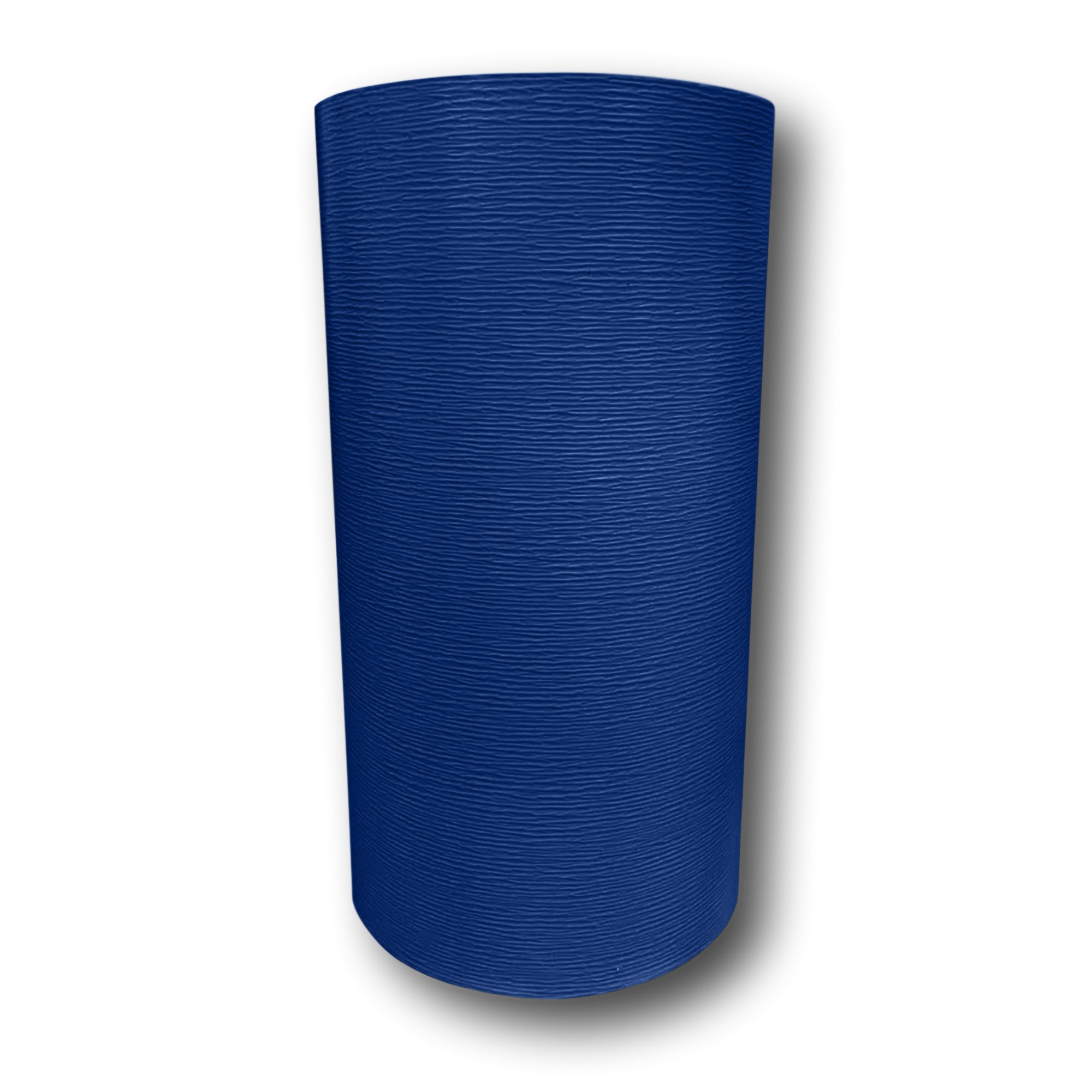 A roll of Woodgrain Finish Aluminum Trim Coil that is most commonly used for wrapping fascia, and door and window trim. The color is Midnight Blue.