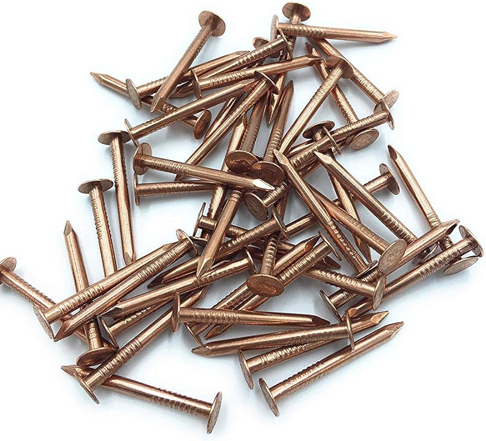 A pile of 1 inch long Copper Roofing Nails. 