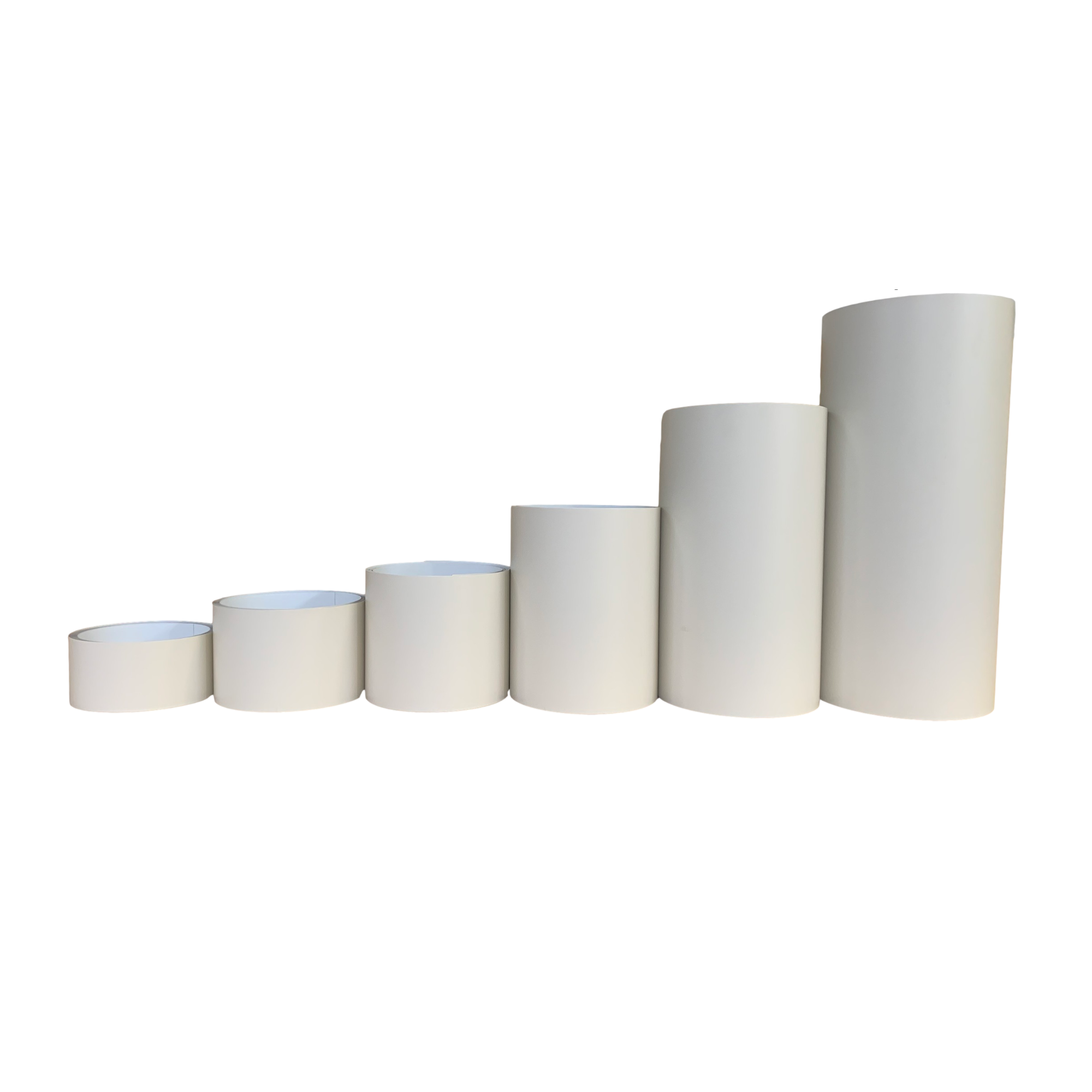 Various rolls of Smooth Aluminum Trim Coil positioned next to each other to visualize each size offered. Each roll is Almond in color. 