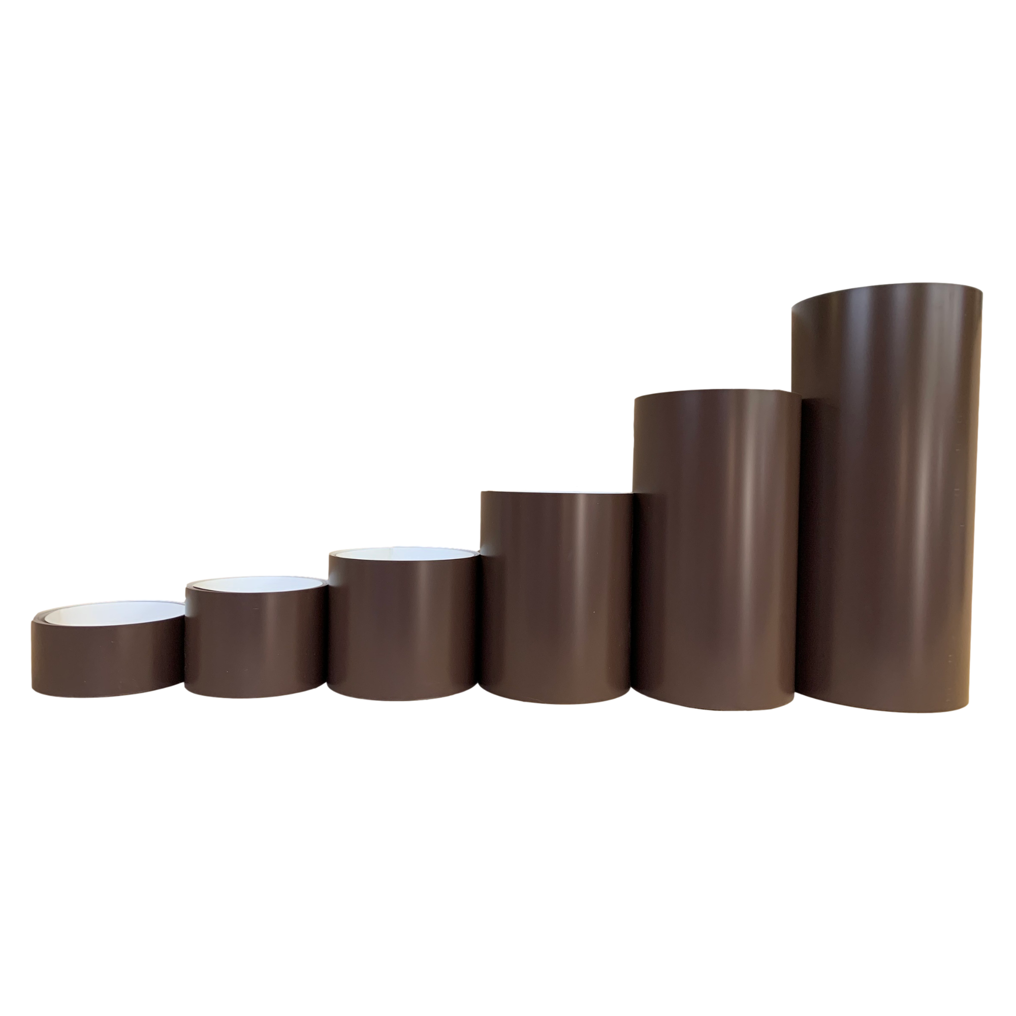 Various rolls of Smooth Aluminum Trim Coil positioned next to each other to visualize each size offered. Each roll is Musket Brown in color. 